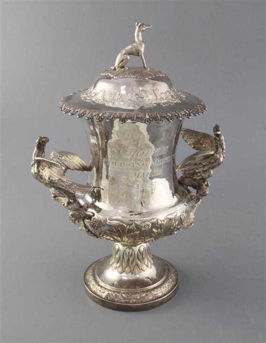 A good George IV silver two handled presentation cup and cover, by Samuel Hennell?,